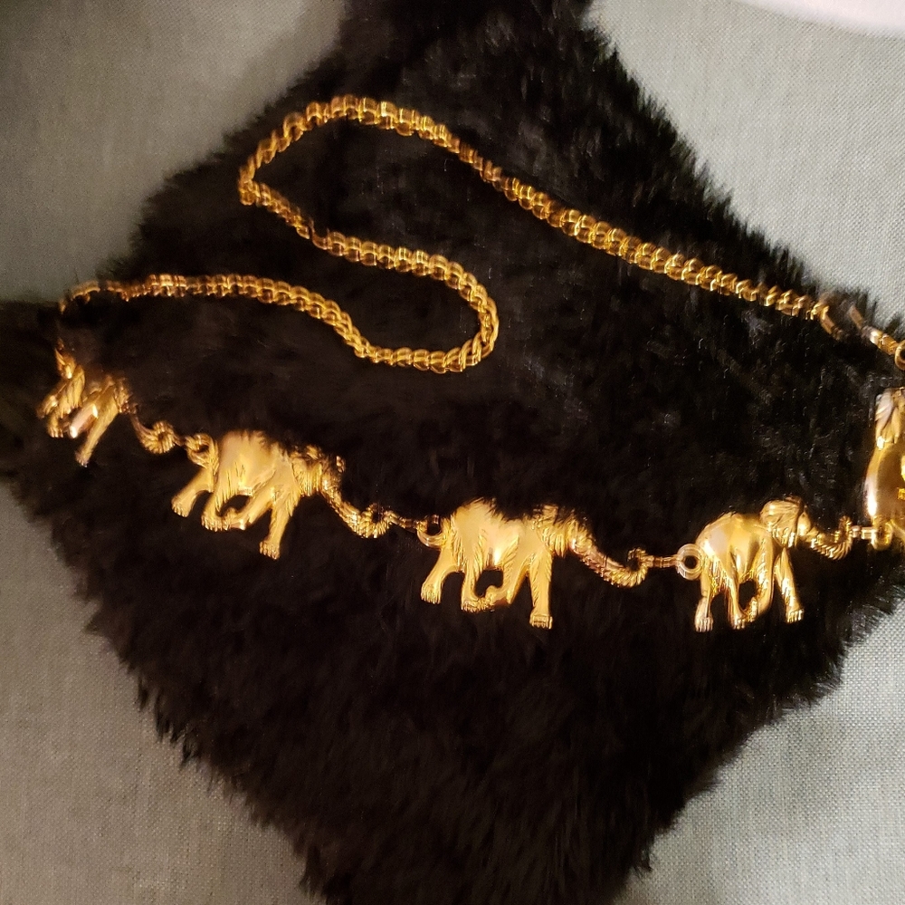 Gold tone elephant belt